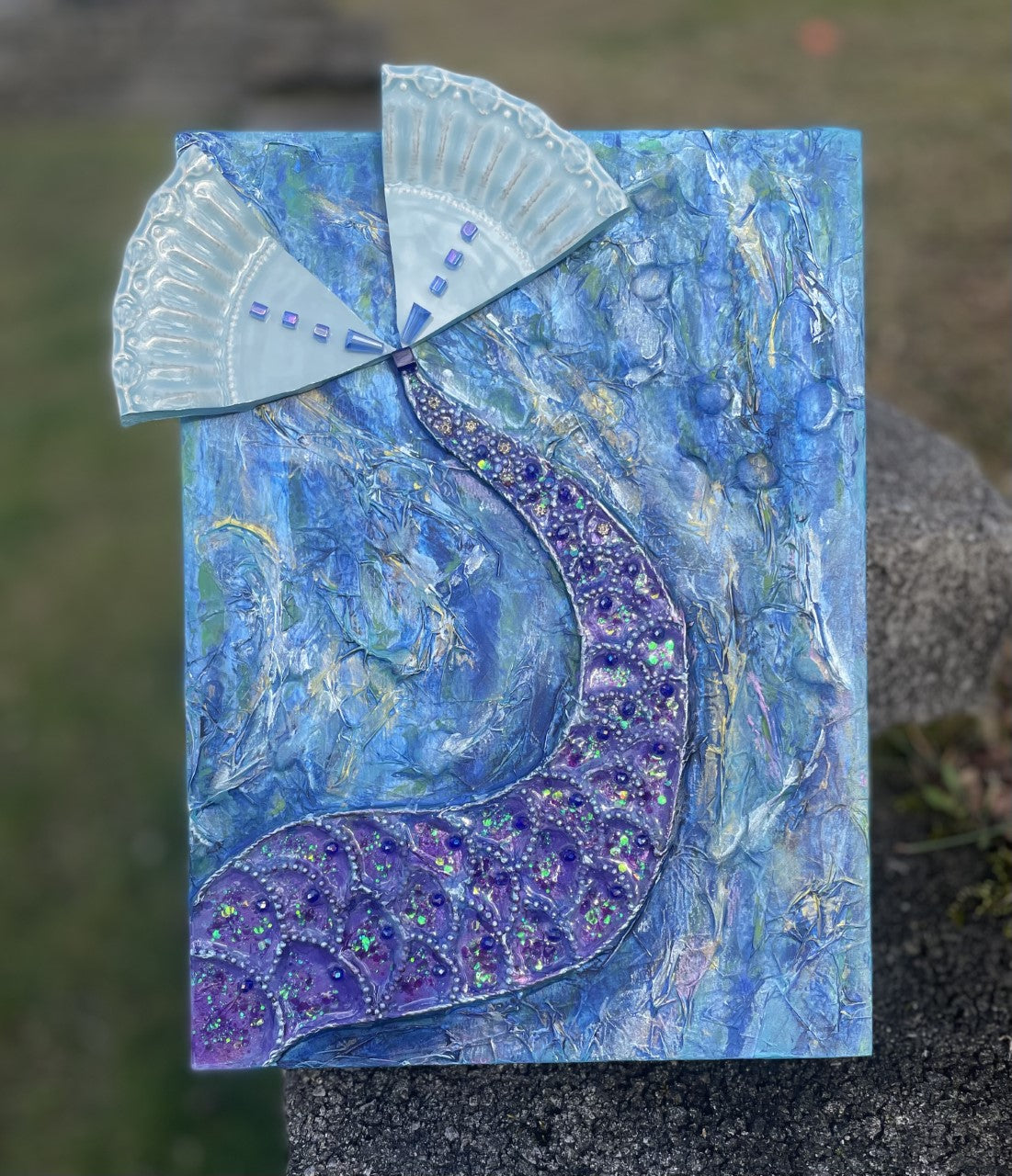 Shimmering purple mermaid tail with broken dish fins wall art